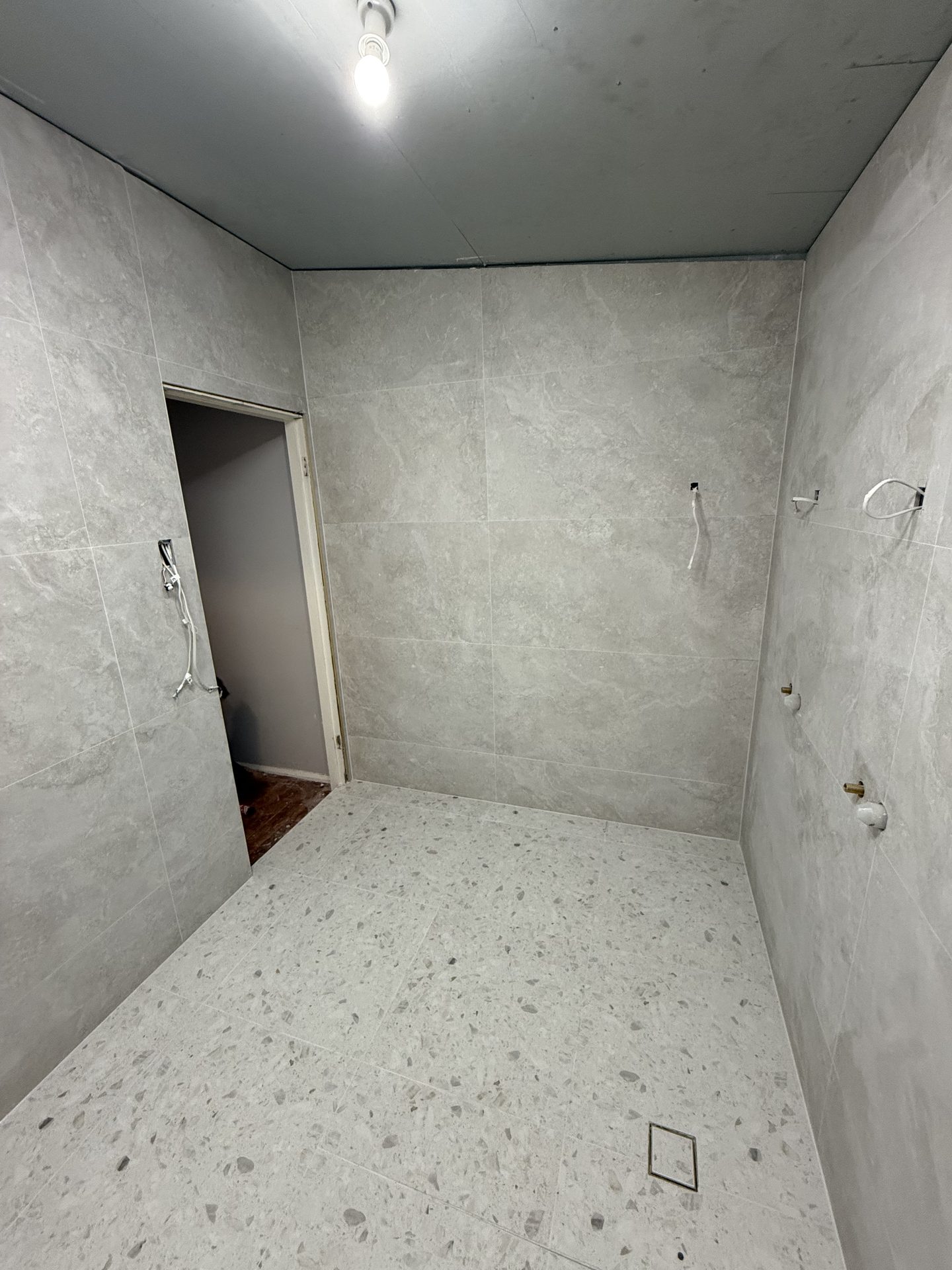 Matte porcelain bathroom floor tiles — tiling Sydney