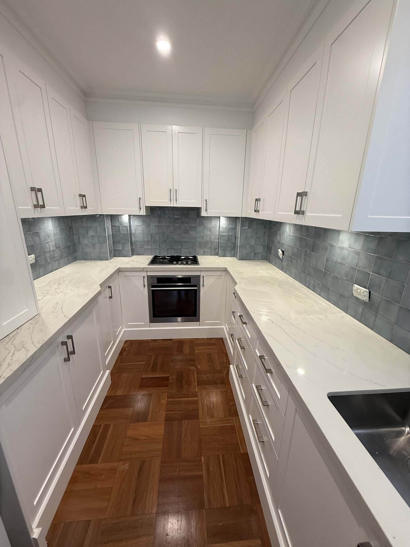 Kitchen after splashback tiling Sydney by S and T Tiling