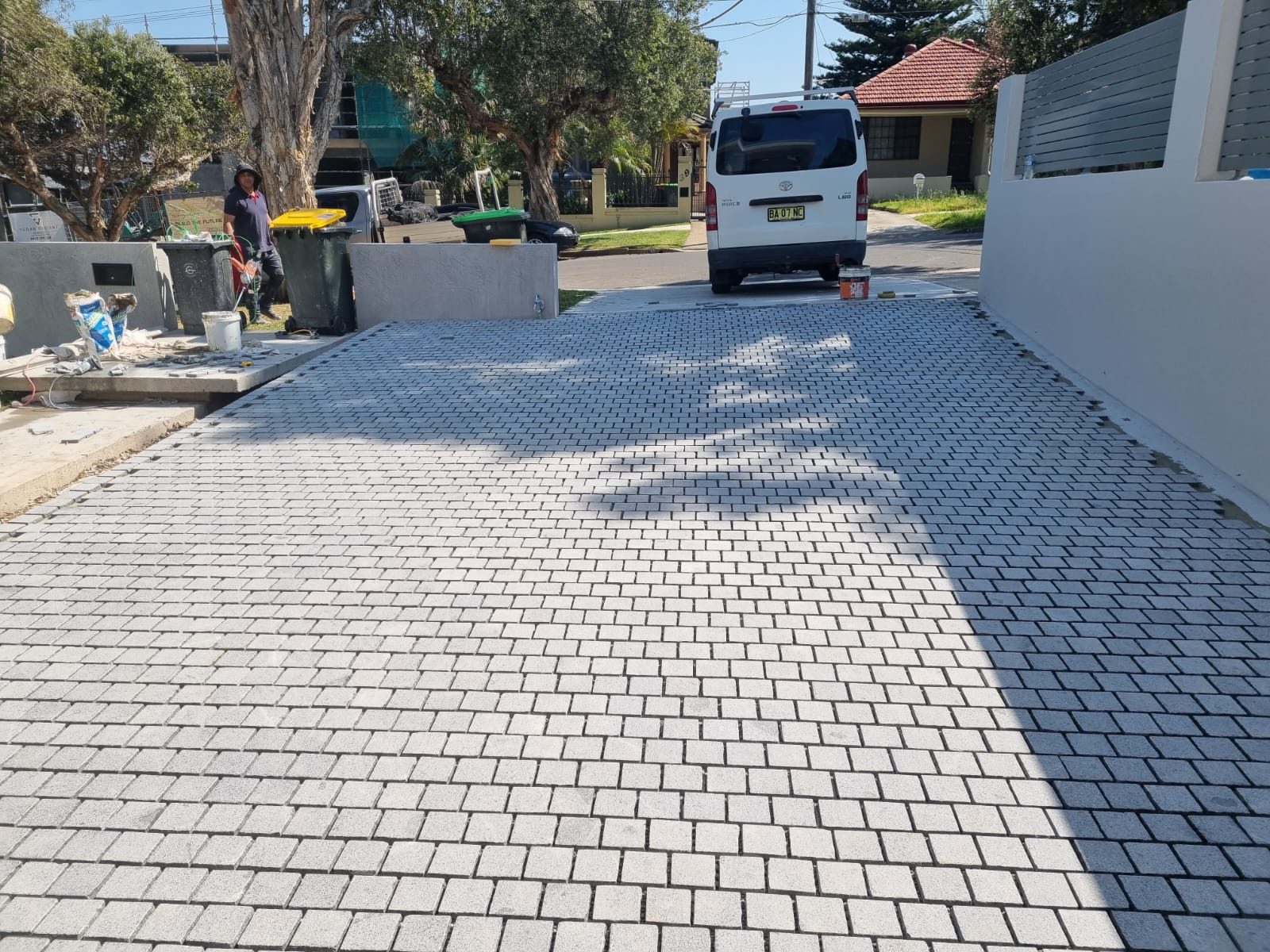 Outdoor tiling Sydney cobblestone driveway