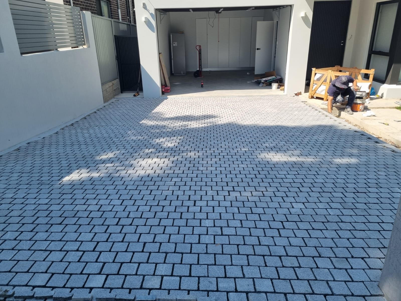 Driveway tiling from garage angle — outdoor tiling Sydney