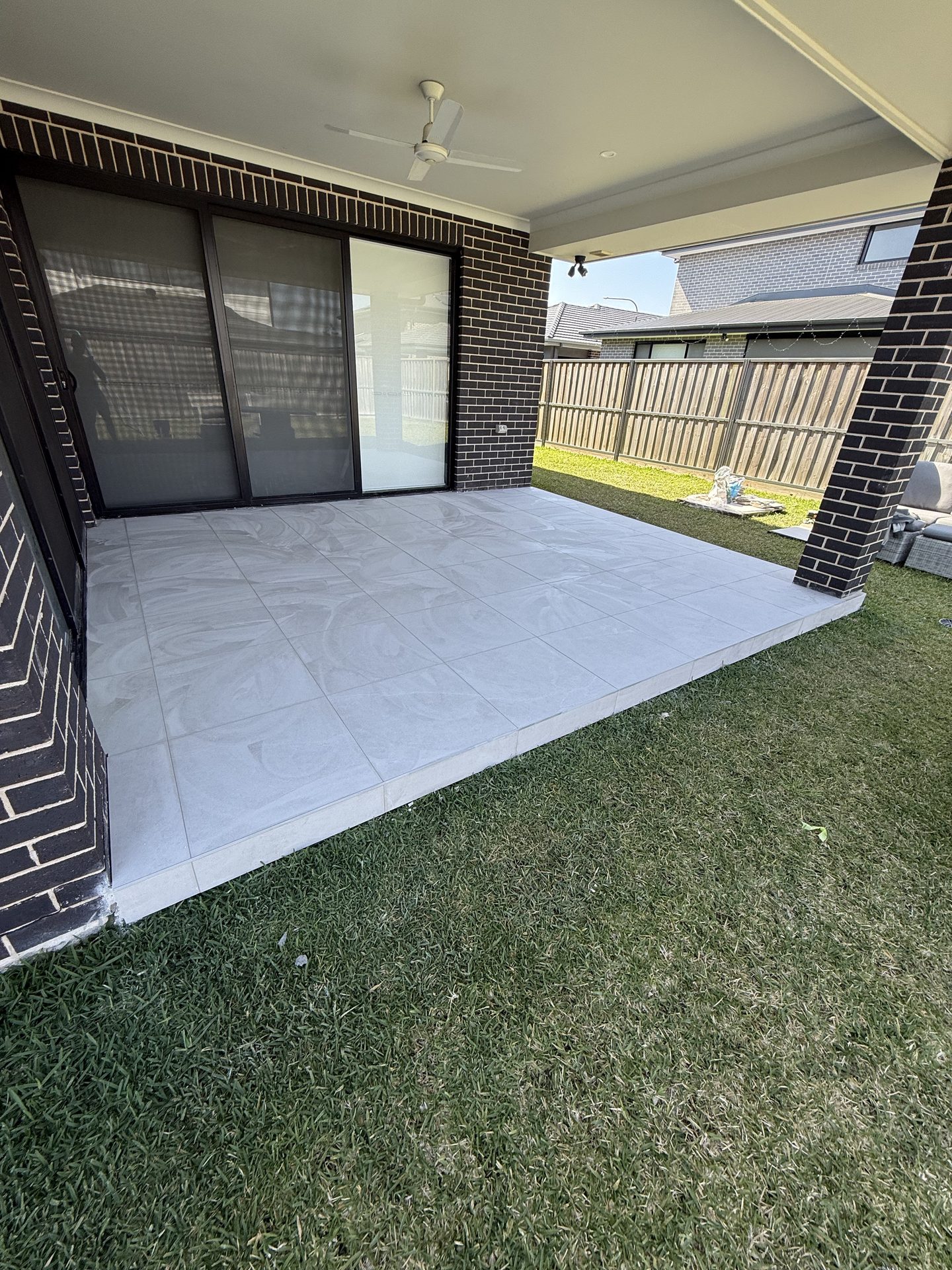 Outdoor entertaining area paving — alfresco tiling Sydney