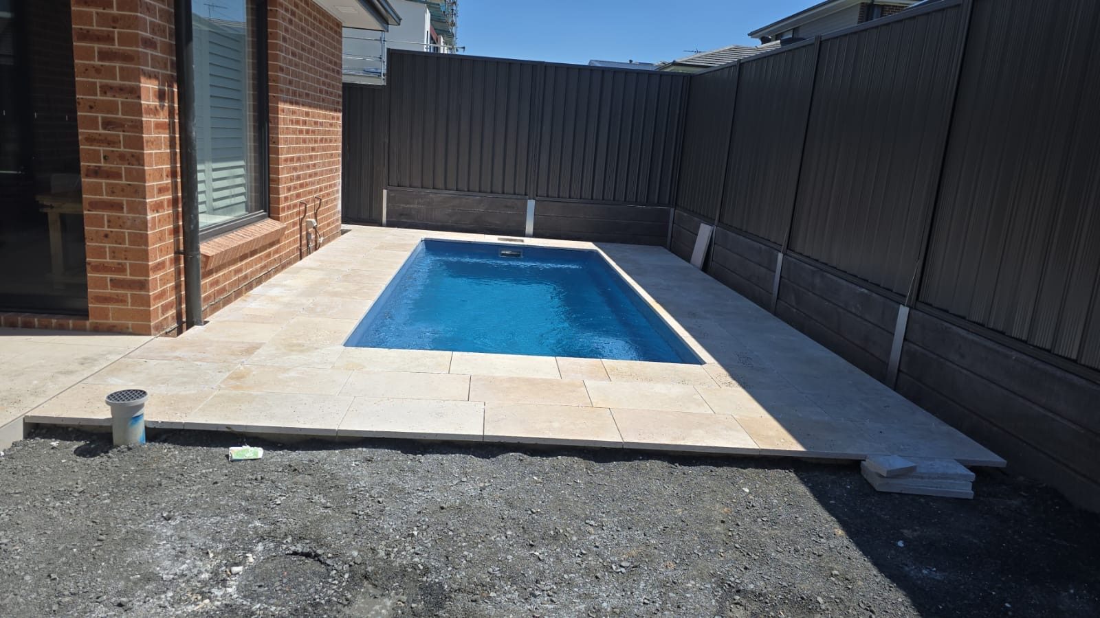 Complete pool tiling with coping and surrounds — outdoor pool tiling Sydney