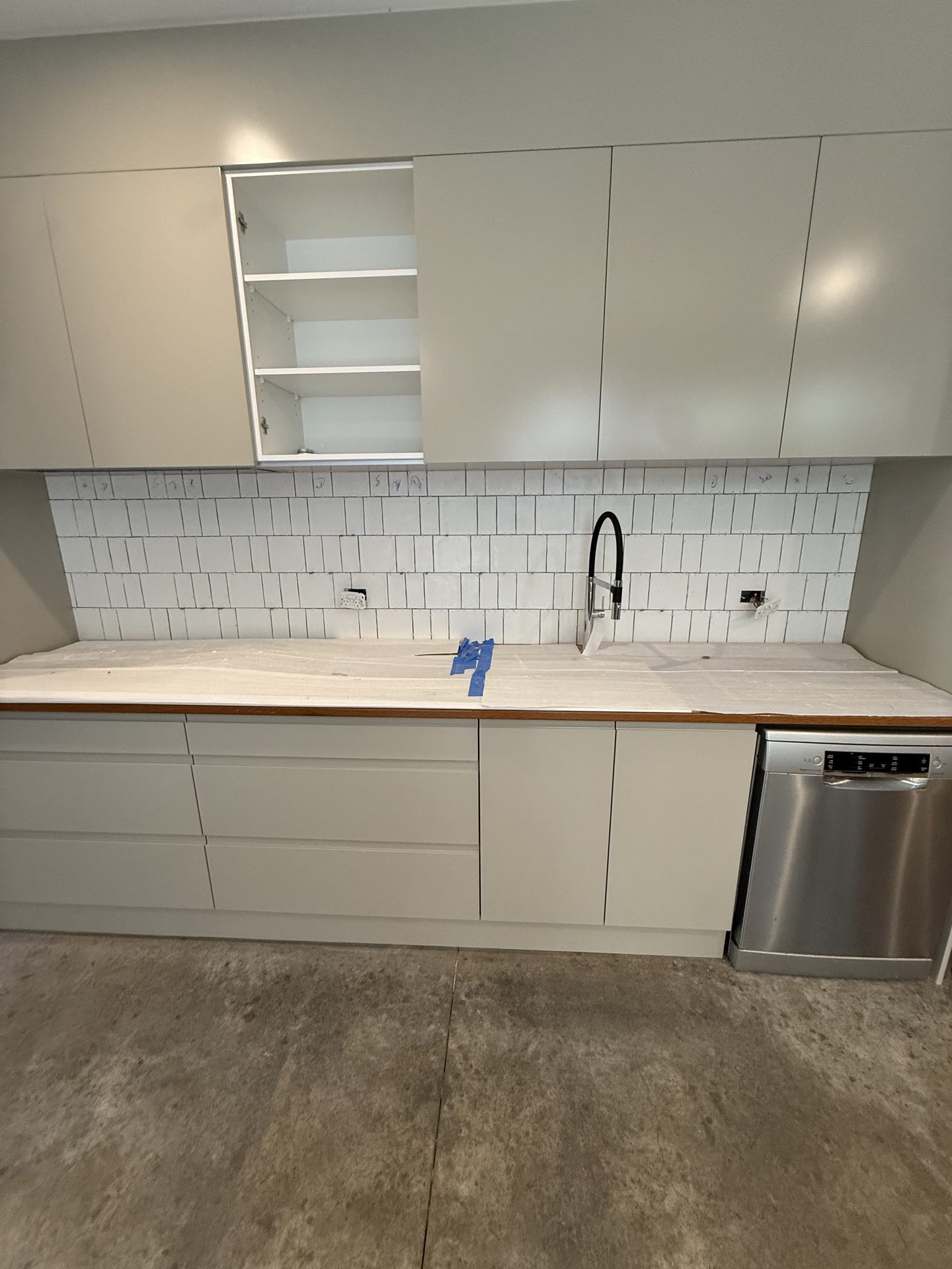 Kitchen splashback tiling with subway tiles — Sydney renovation