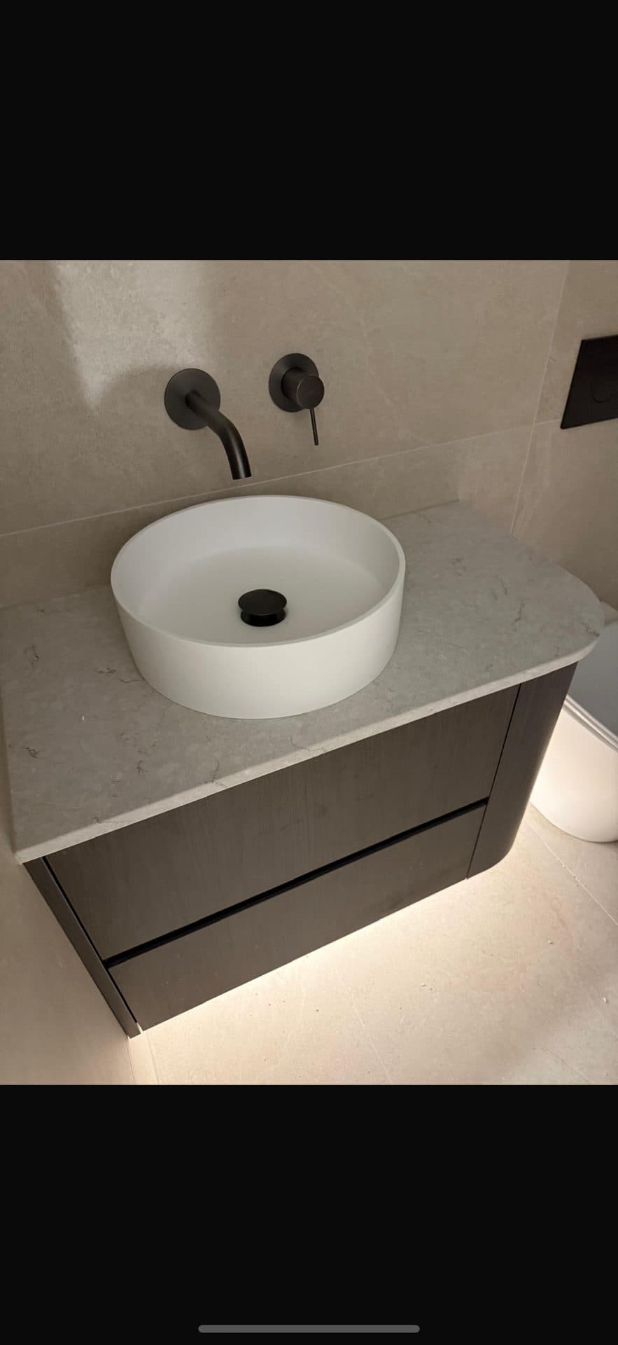 Vanity close-up with LED lighting strip — bathroom renovation Sydney