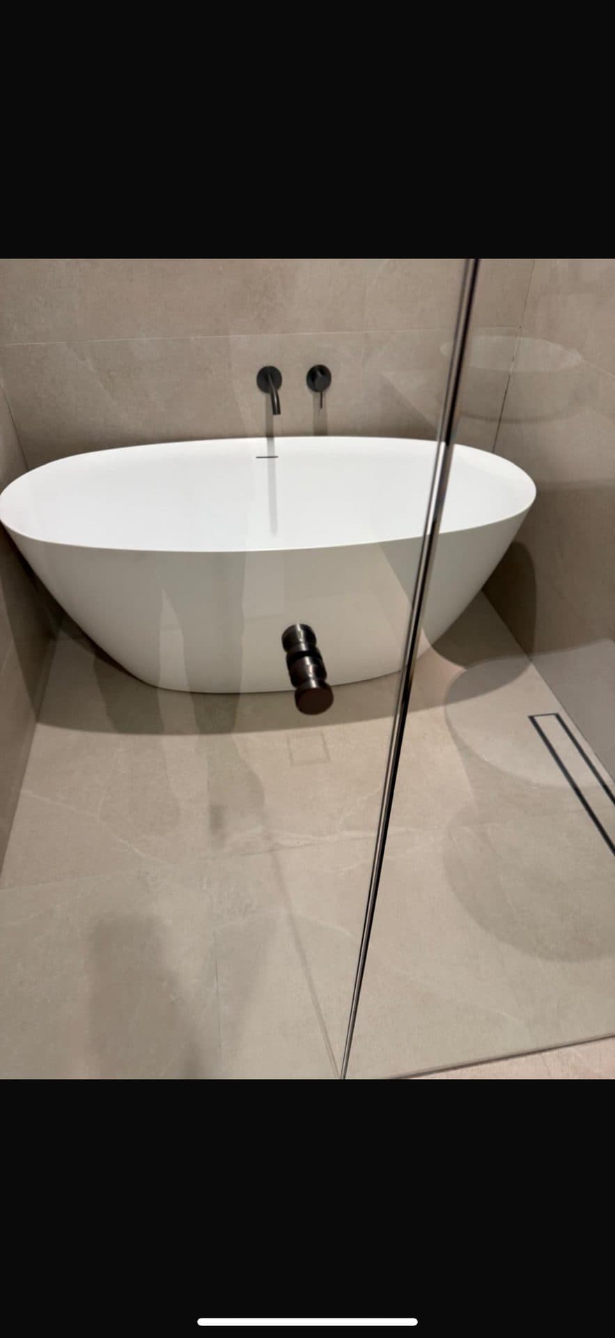 S & T Tiling Renovations team working on a bathroom in Annandale