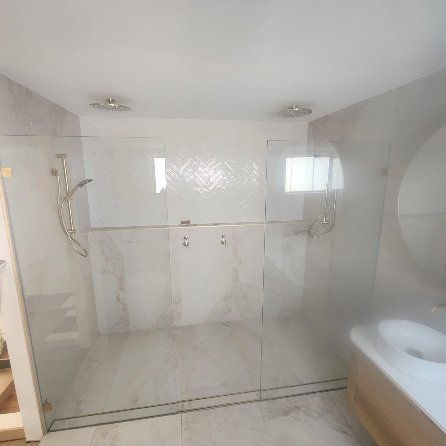 Freshly regrouted shower tiling in a Sydney bathroom by S & T Tiling Renovations