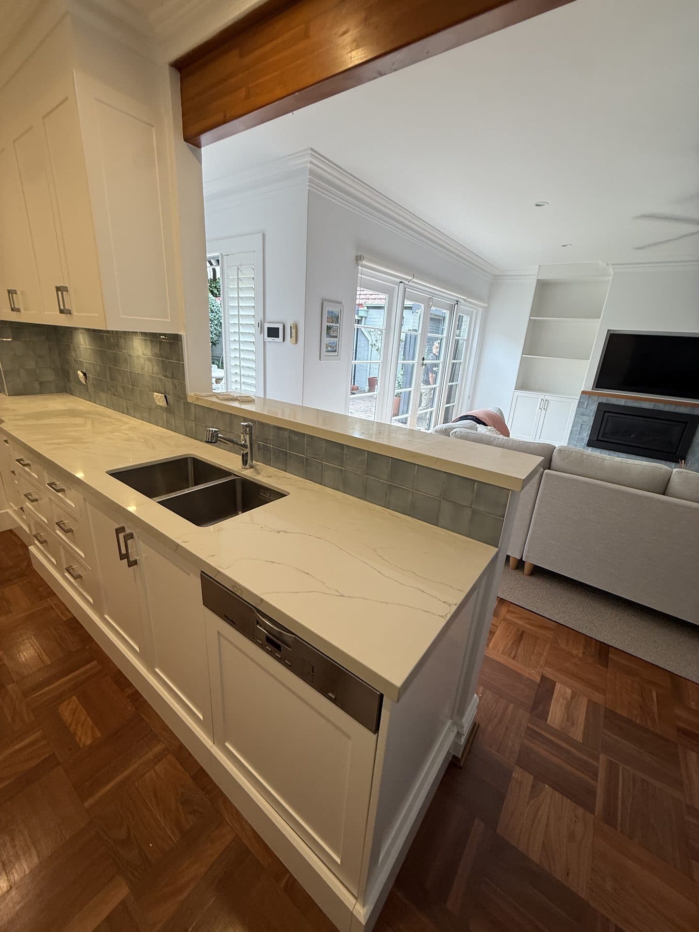 Large format porcelain kitchen splashback — tiling Sydney